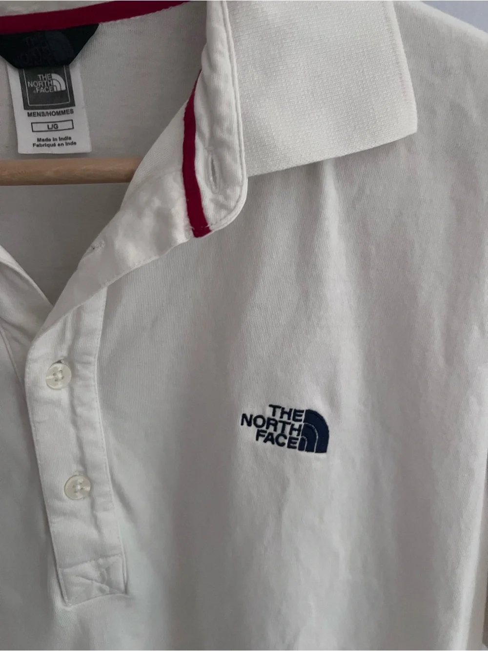 The North Face Men's off white/ cream colored Polo with Red Collar Trim
